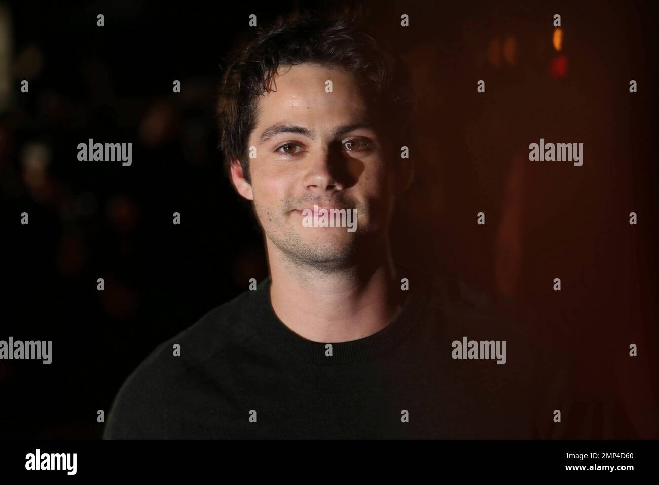 Actor Dylan O'Brien poses for photographers upon arrival at the fan