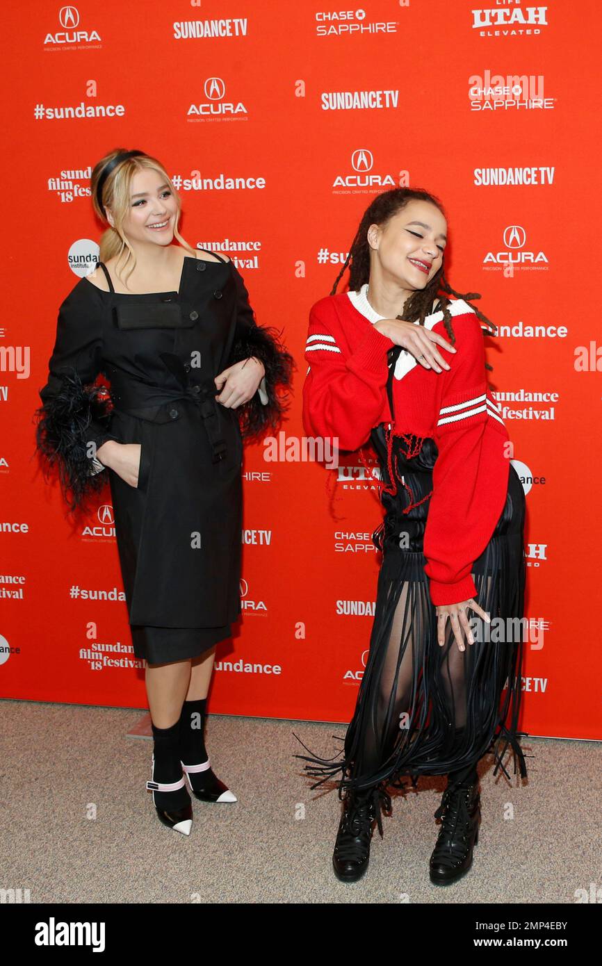 Actresses Chloe Grace Moretz, left, and Sasha Lane, right, pose at the premiere of "The
