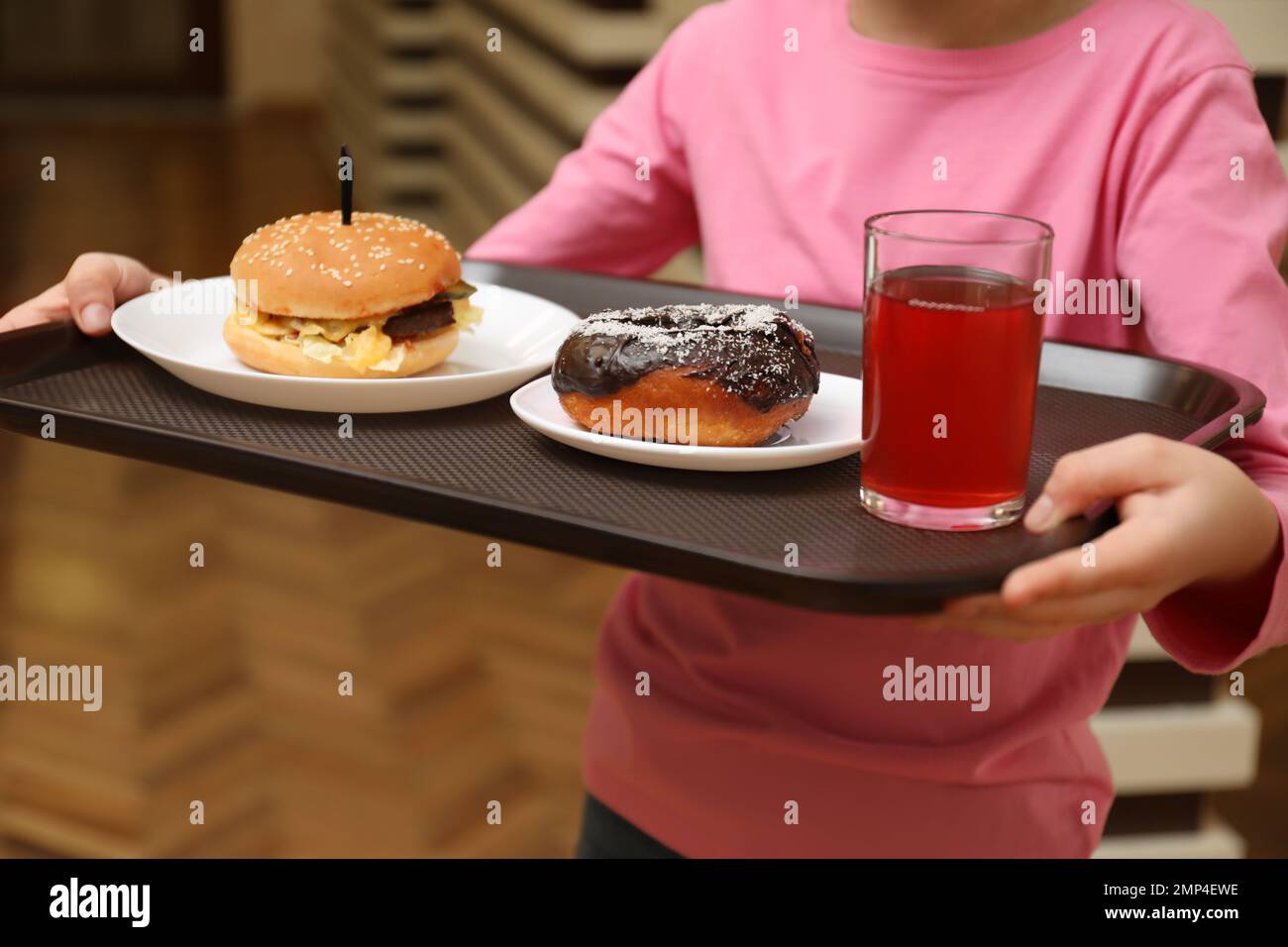 Little girl with tasty food in school canteen, closeup Stock Photo Alamy