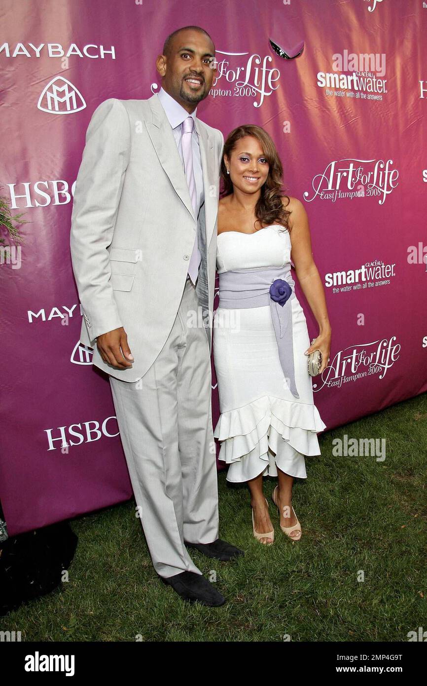 Tamia (R) and Grant Hill (L) at Russell Simmons' 9th Annual Art for Life East Hampton 2008 benefit gala at Russell Simmons' East Hampton Estate in East Hampton, NY. 7/19/08. . Stock Photo