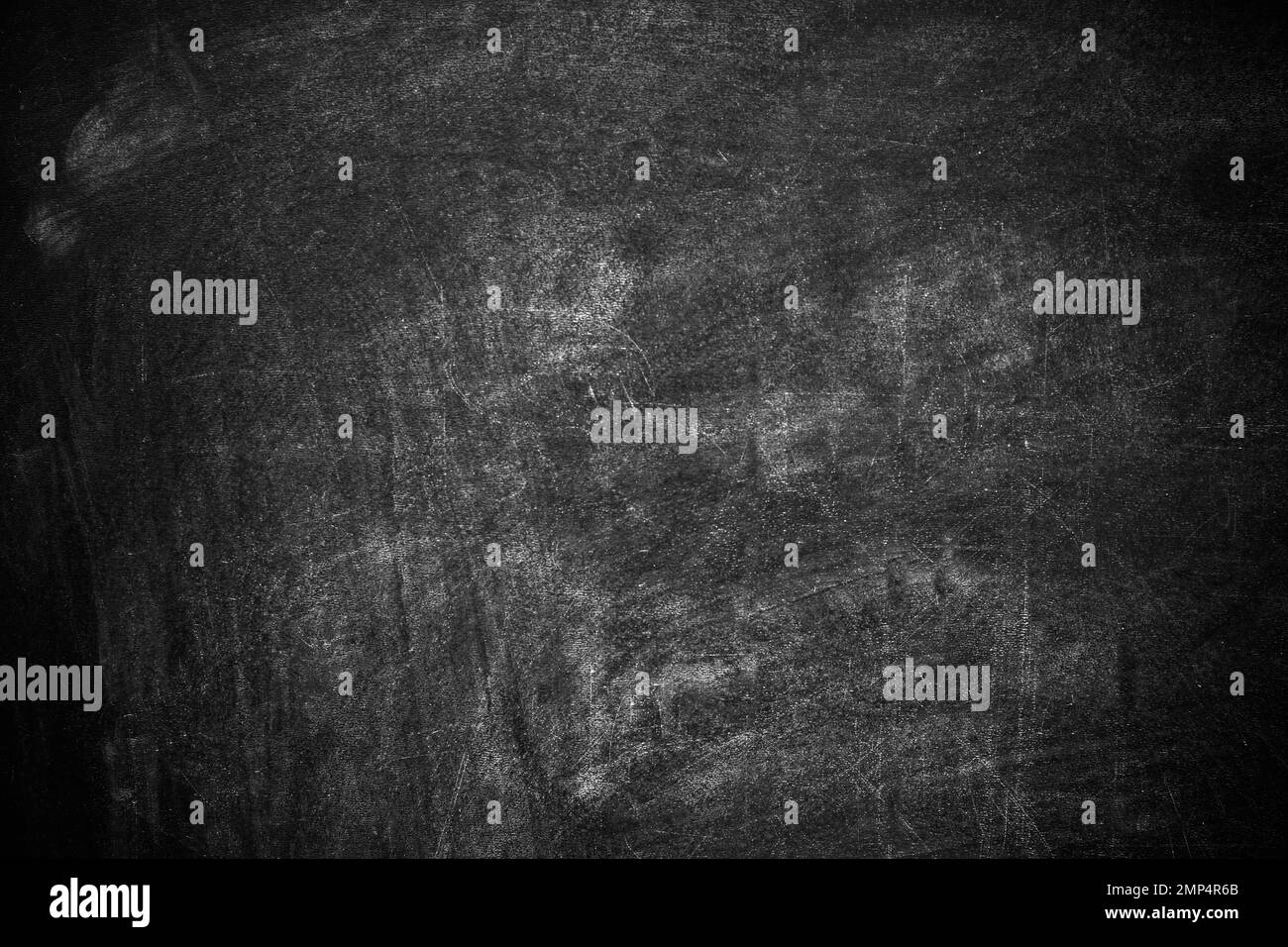 Dirty black chalkboard as background. Space for text Stock Photo