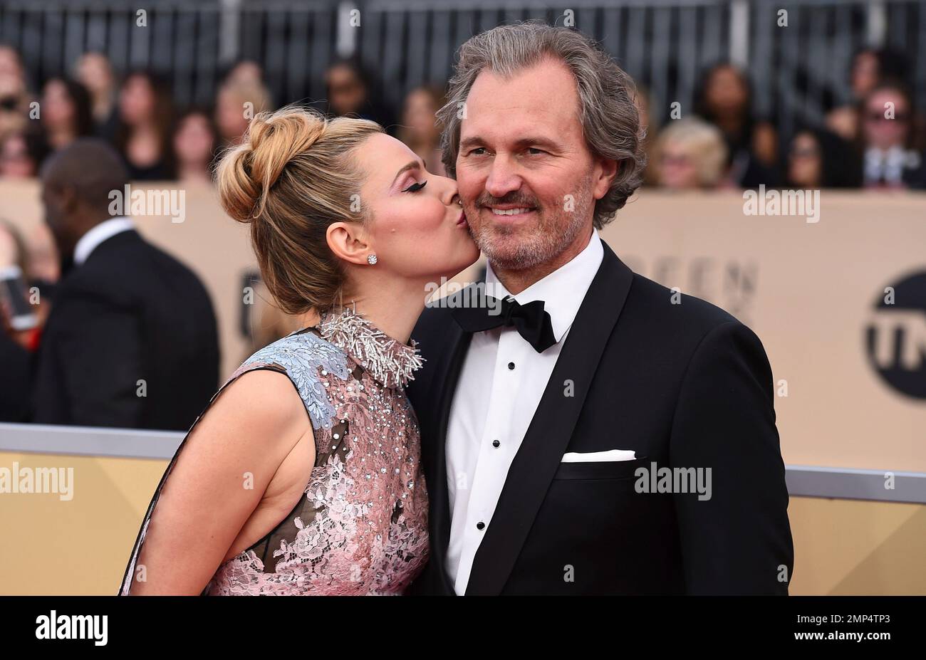 Cara Buono, left, and Peter Thum arrive at the 24th annual Screen