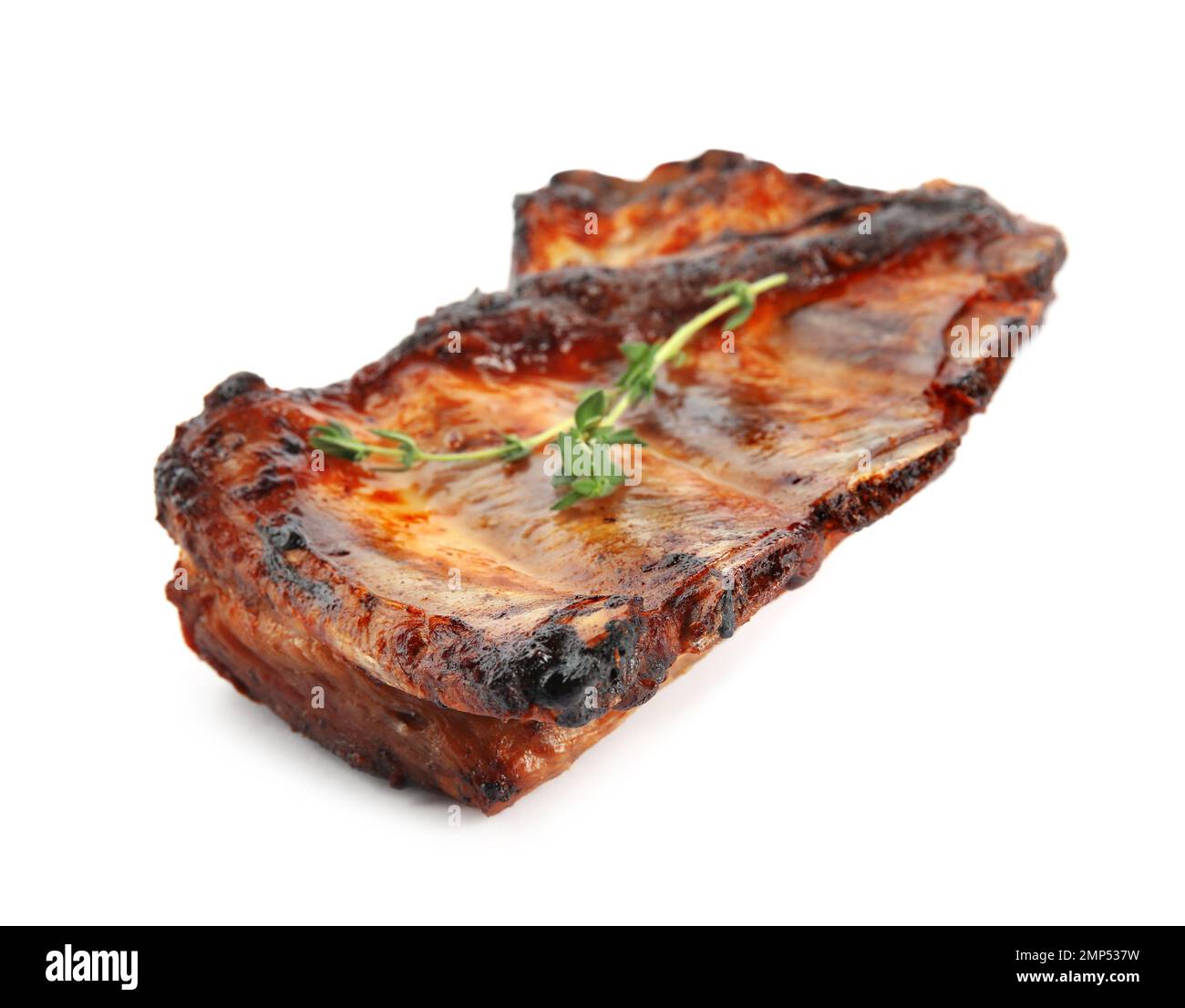 Tasty grilled ribs with thyme isolated on white Stock Photo - Alamy