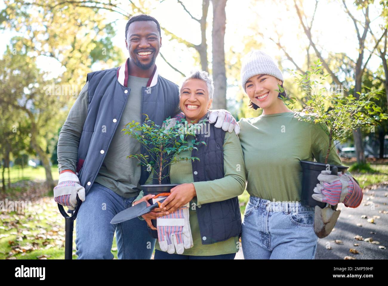 Trees, garden and plants people in portrait community service, sustainability collaboration and eco friendly project. Gardening, sustainable growth Stock Photo