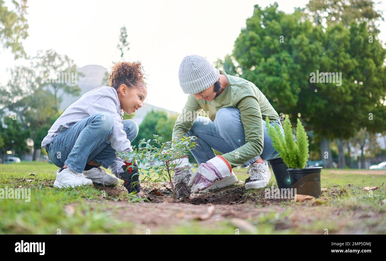 Family, plant and gardening in a park with trees in nature environment, agriculture or garden