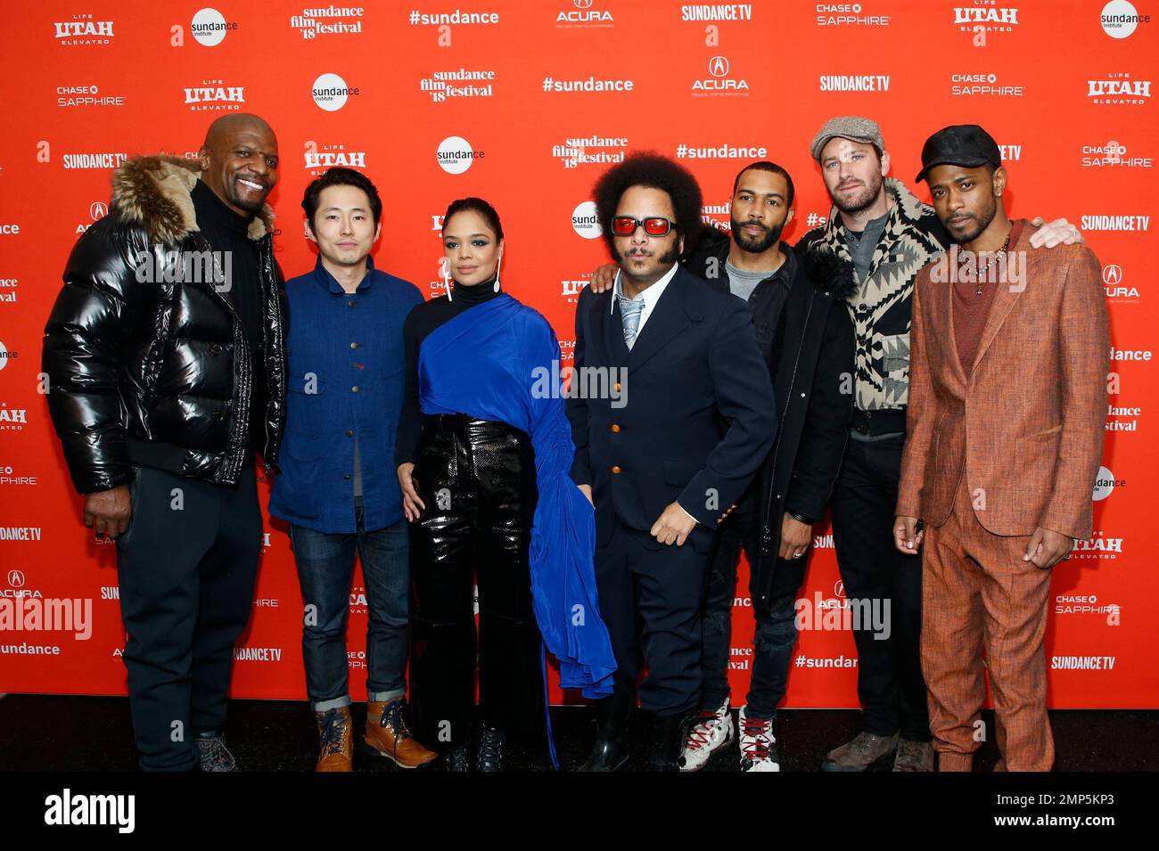 Director Boots Riley, fourth left, poses along with cast members, from
