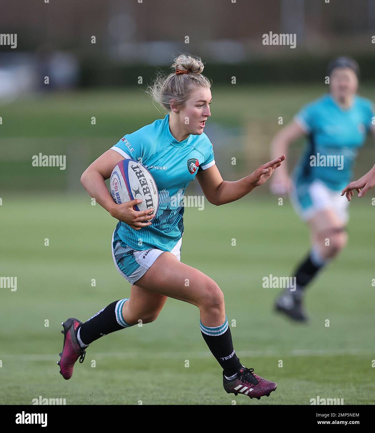 29.01.2023   Loughborough, England. Rugby Union.                   Morgan Richardson makes a break  for Tigers during the match played between Leicester Tigers Ladies and Loughborough Ladies in the  RFC Women’s Championship North 1 at Loughborough University.  © Phil Hutchinson Stock Photo