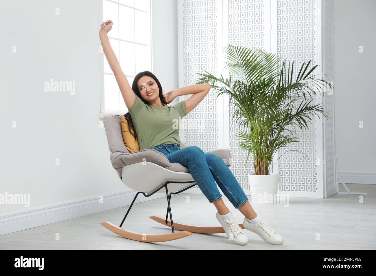 Sitting In Rocking Chair Girl sitting in rocking chair hi-res stock photography and images - Alamy
