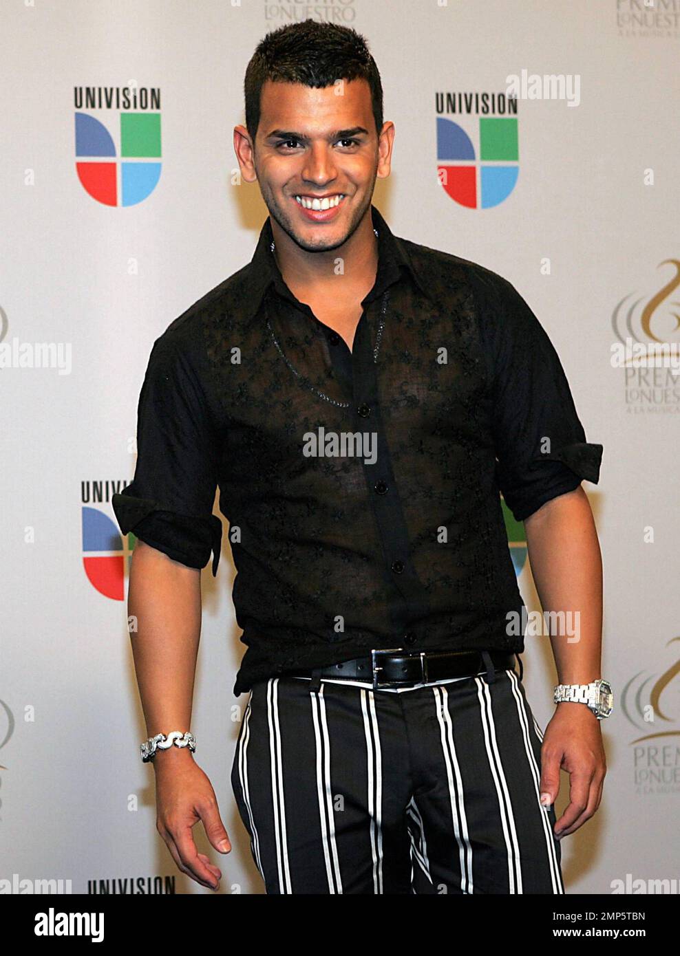 Tito El Bambino Appears Backstage At The 2010 Premio Lo Nuestro Award Show At American Airlines
