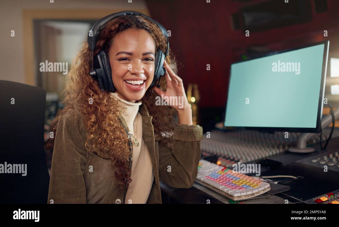 Portrait, musician and technology mockup screen for music recording, sound mixing or studio song composition. Producer, happy or woman DJ on computer Stock Photo