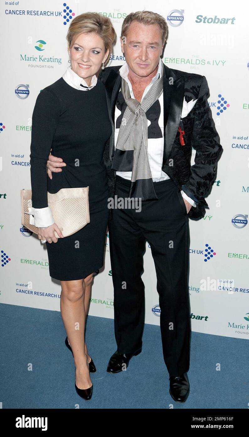 Michael Flatley and guest attends the Emeralds & Ivy Ball in aid of Cancer Research UK and the Marie Keating Foundation held at Supernova. London, UK. 3rd December 2011. Stock Photo