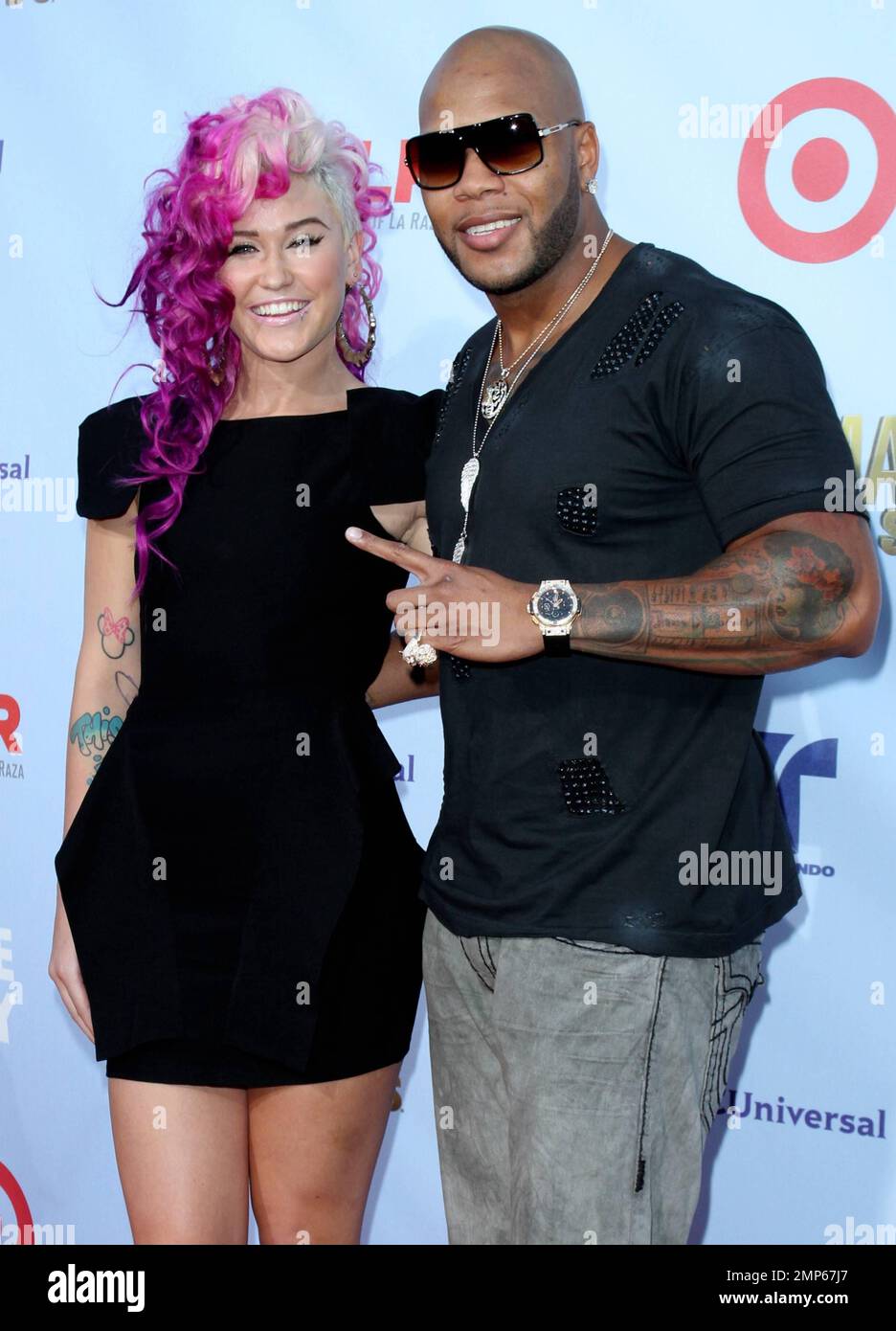 Static Flo The Rapper Rapper Flo Rida (R) and StayC at the 2012 NCLR ALMA Awards held at the ...