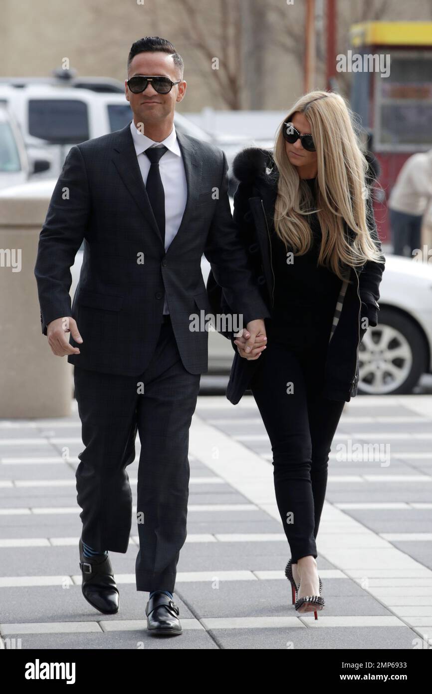 Michael "The Situation" Sorrentino, left, one of the former stars of the  "Jersey Shore" reality TV show, walks with his fiancee Lauren Pesce while  arriving at the Martin Luther King, Jr., Federal