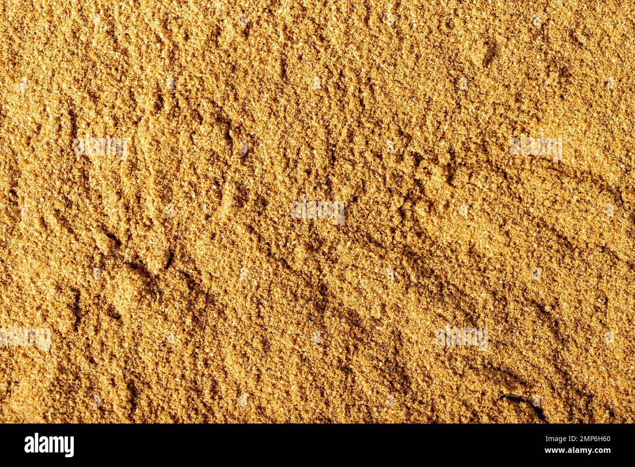 Powdered cumin spice. Heaps of cumin spice. Food background. Dry spice