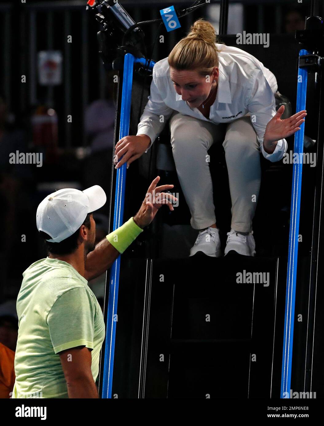 Spain's Fernando Verdasco argues with chair umpire Aurelie Tourte