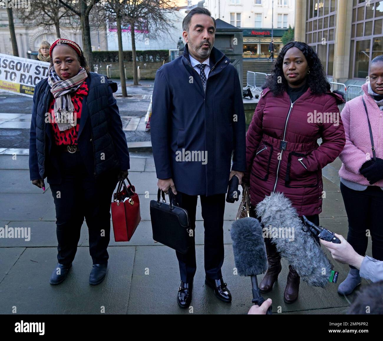 Laywer Aamer Anwar (centre) with Sheku Bayoh's sisters Kadi Johnson (right) and Kosna Bayoh (left) arriving at Capital House in Edinburgh for the public inquiry into his death. Bayoh died in May 2015 after he was restrained by officers responding to a call in Kirkcaldy, Fife. Picture date: Tuesday January 31, 2023. See PA story INQUIRY Bayoh. Photo credit should read: Andrew Milligan/PA Wire Stock Photo