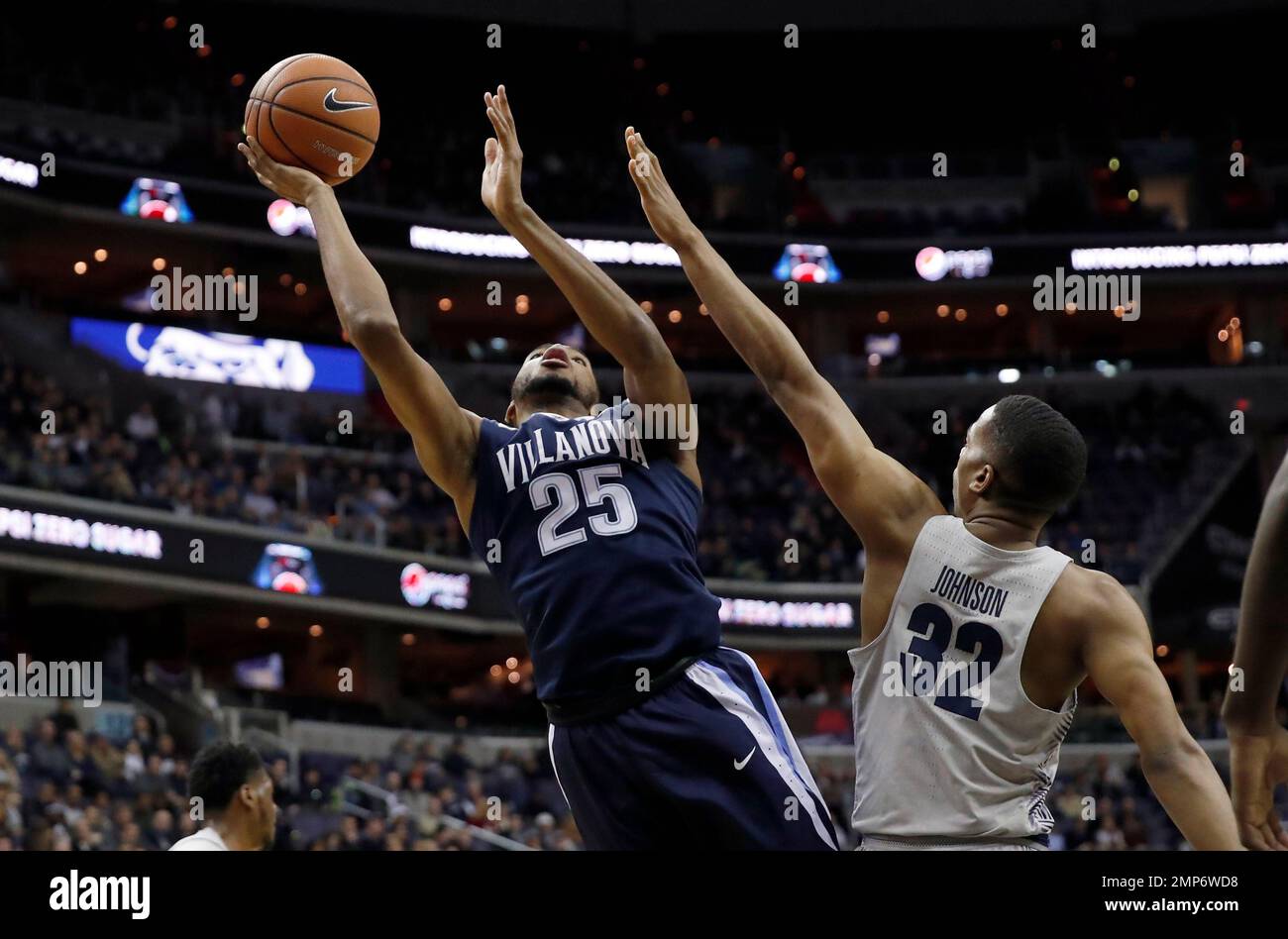 Villanova guard Mikal Bridges (25) shoots over guard Kaleb Johnson (32) during the