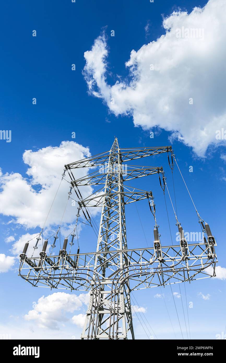 electricity pylon on blue cloudy sky industry high voltage Stock Photo ...