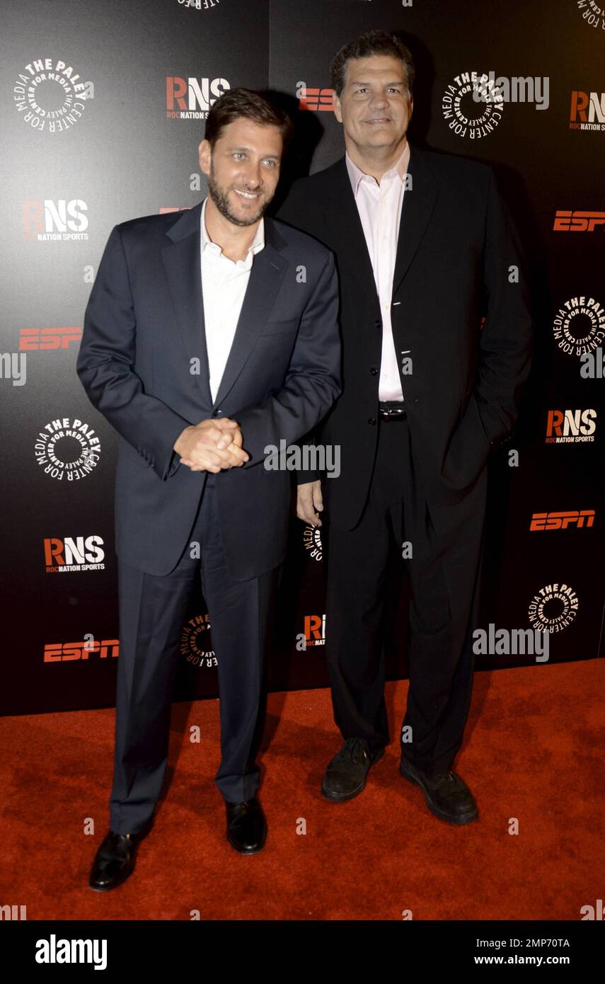 ESPN hosts Mike Greenberg (L) and Mike Golic at the Paley Prize Gala Honoring ESPN's 35th Anniversary Presented By Roc Nation Sports. New York, NY. 28th May 2014. Stock Photo