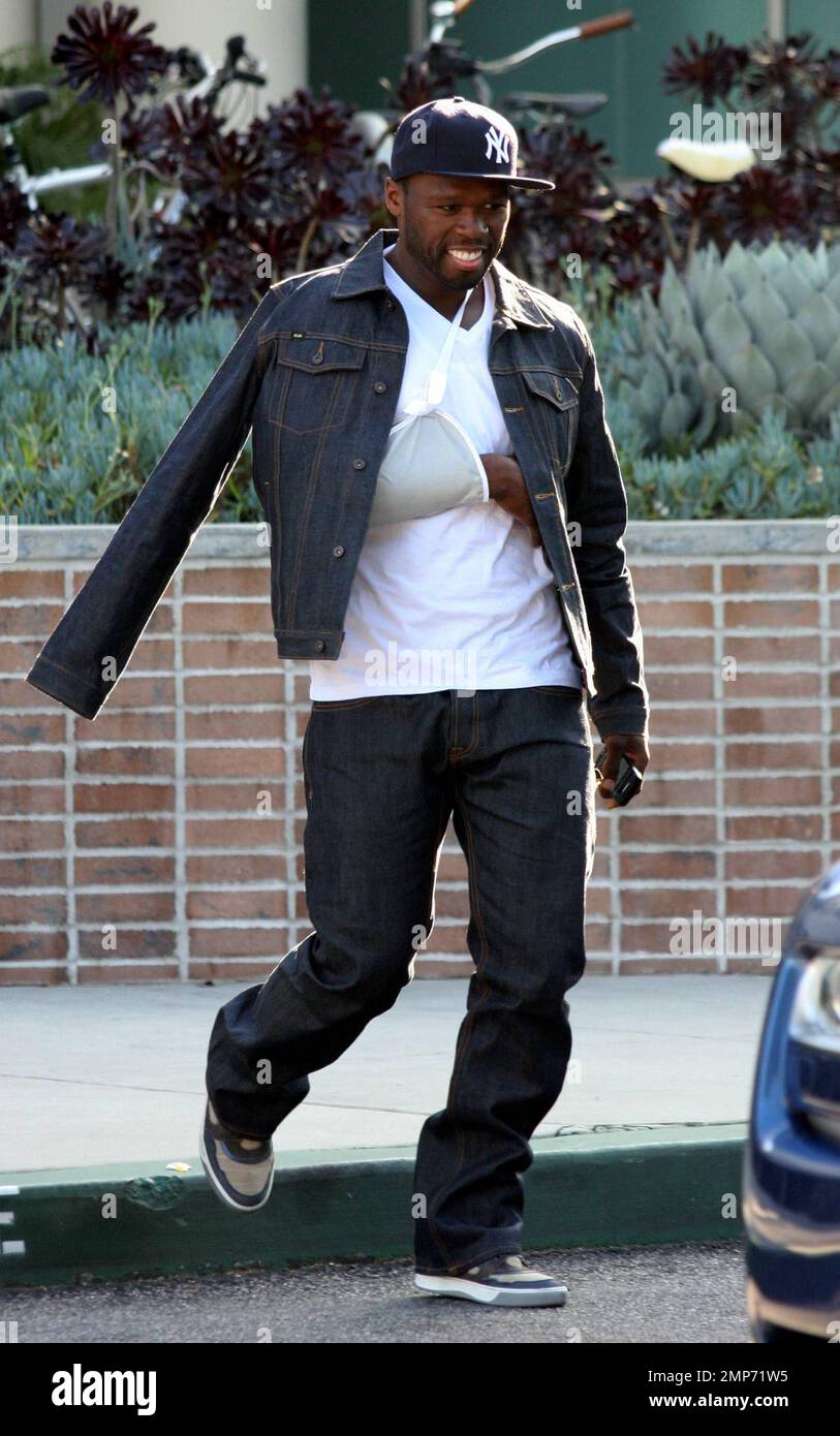 Rapper 50 Cent leaves the "Chelsea Lately" show studios with his arm a cast after filming a spoof video alongside Internet sensation Keenan Cahill for Chelsea Handler's show. 50 who
