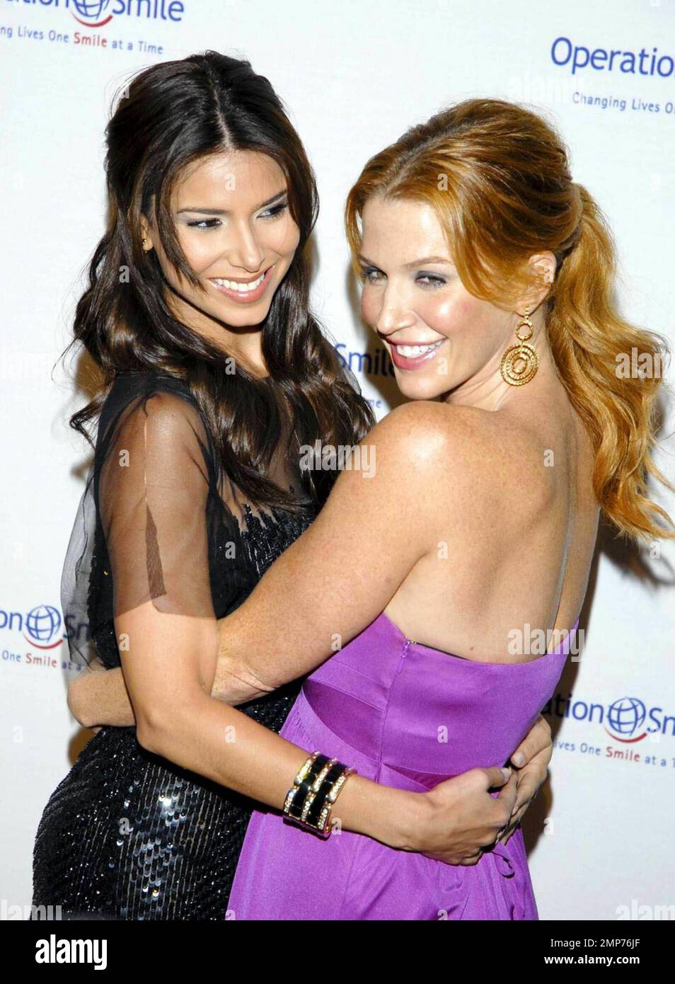 Poppy Montgomery and Roselyn Sanchez attend Operation Smile's eighth