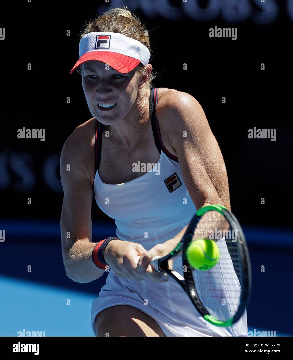 Australia's Olivia Rogowska makes a backhand return to Ukraine's Marta
