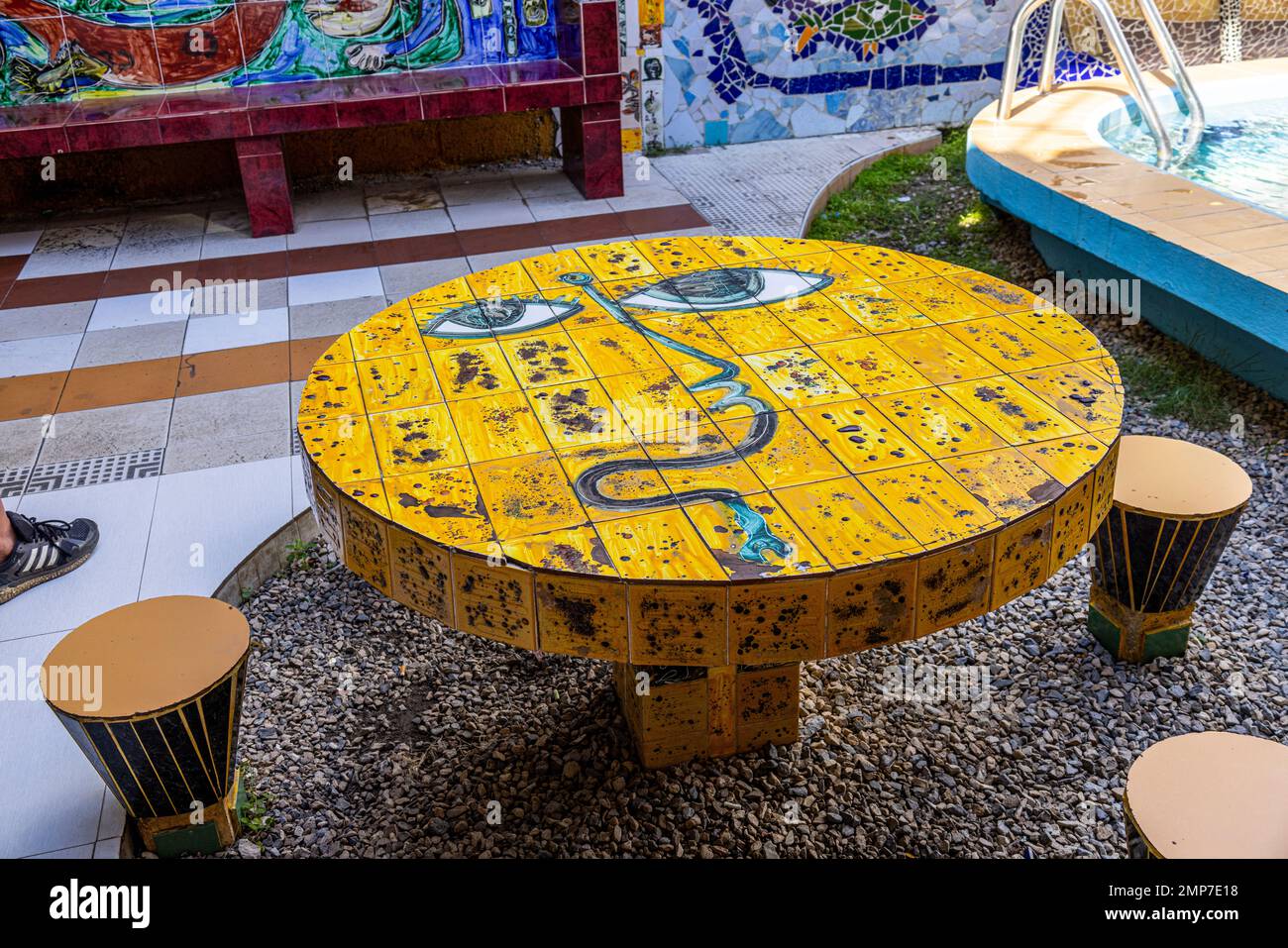 Tiled mosaic table in courtyard of workshop studio of Jose Fuster at Fusterlandia, 'Homage to Gaudi', Jaimanitas, Havana, Cuba Stock Photo