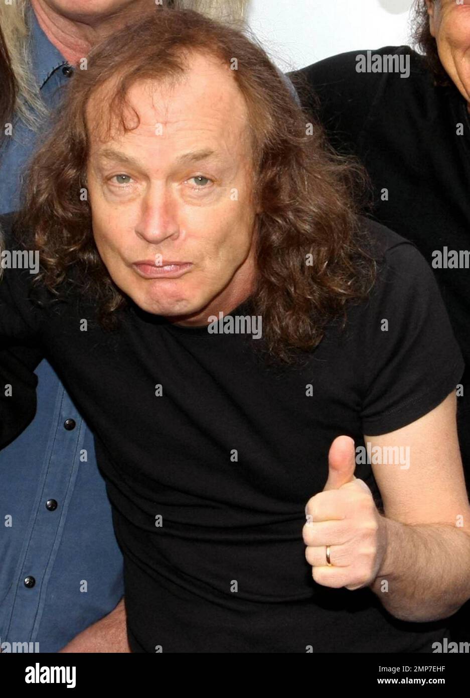 AC/DC band member Angus Young at the AC/DC 'Live at River Plate' DVD World Premiere at the HMV Hammersmith Apollo. London, UK. 5/6/11. Stock Photo