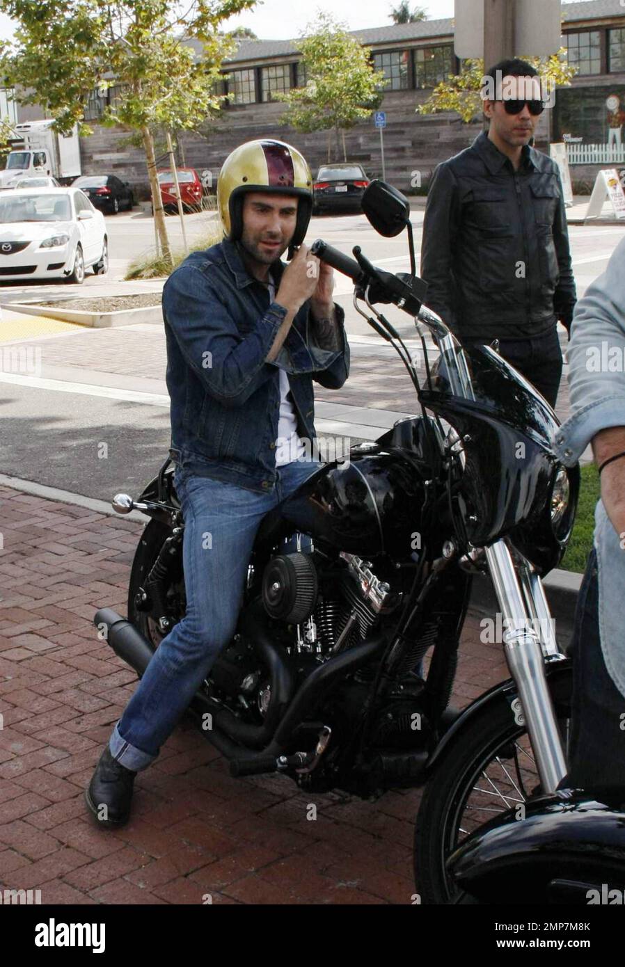 Maroon 5 singer Adam Levine arrives at Café Habana on his motorcycle