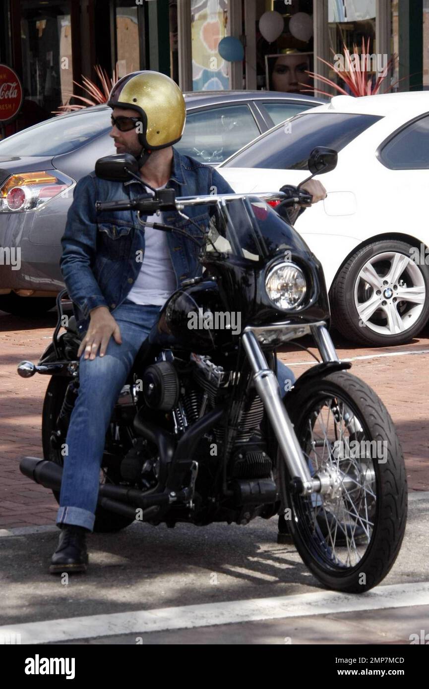 Maroon 5 singer Adam Levine arrives at Café Habana on his motorcycle