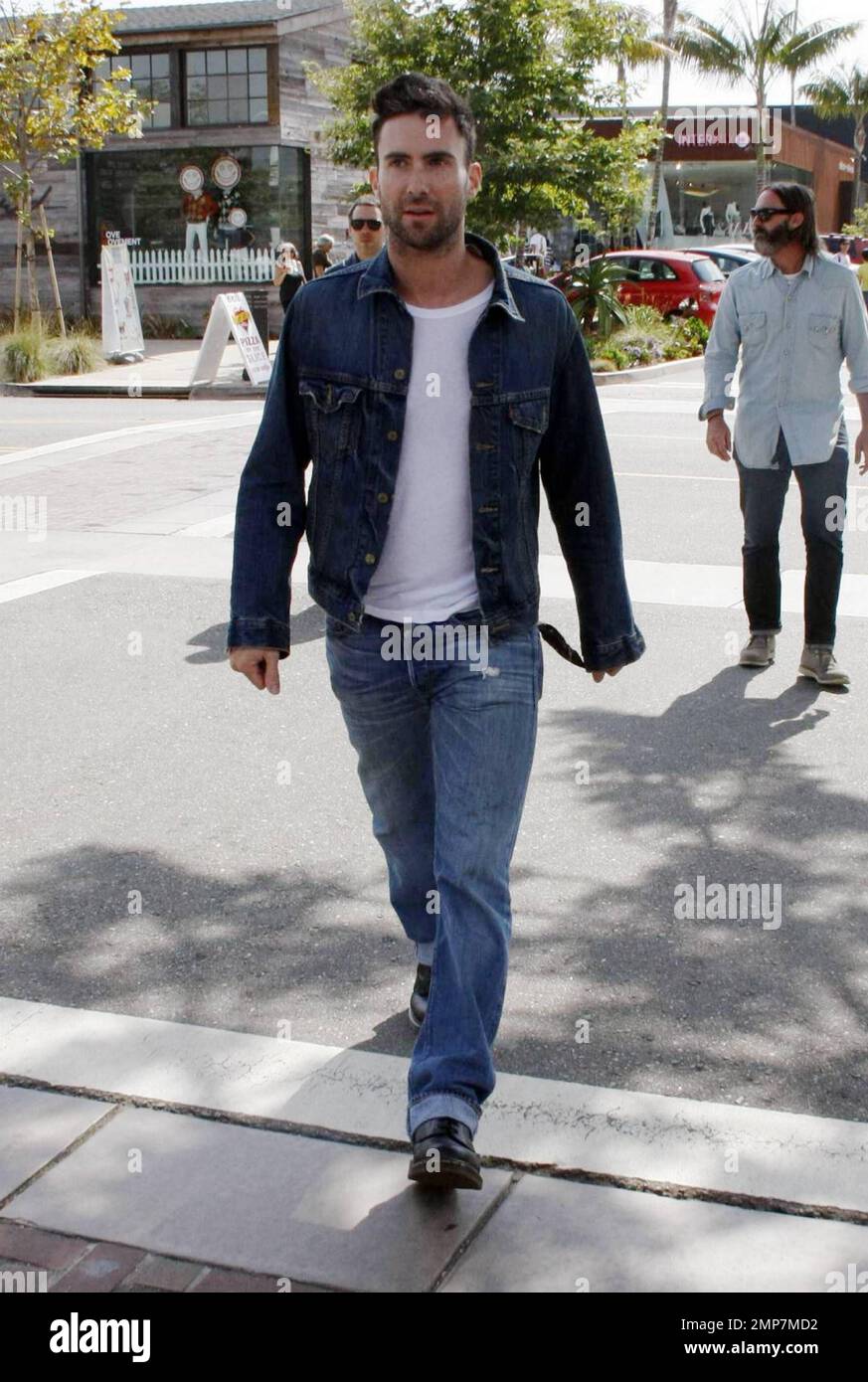 Maroon 5 singer Adam Levine arrives at Café Habana on his motorcycle