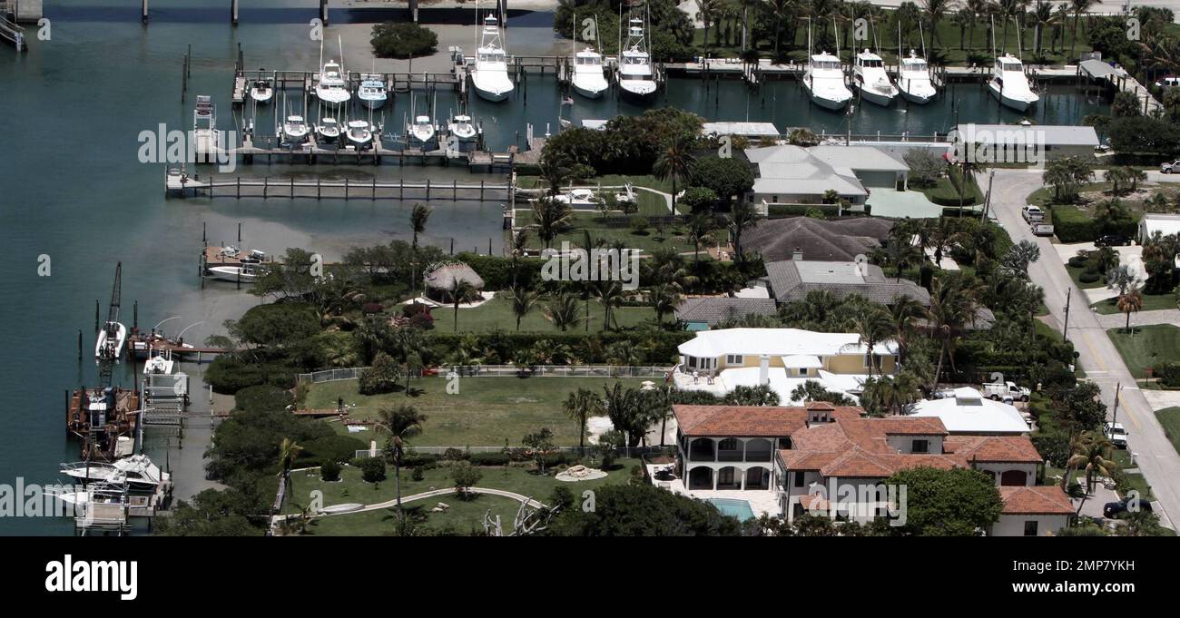 EXCLUSIVE!! Aerial views of actress Olivia Newton-John's $4.1 million, 7000-square-foot home that is currently under renovation.  The Jupiter Inlet Colony, Palm Beach waterfront home was bought by the "Grease" star and her husband John Easterling in June 2009 one year after the couple wed.  The two-story house that has been described as having a Key West feel, has a wide floor plan, four bedrooms and is pet friendly.  Jupiter, FL. 04/27/10. Stock Photo