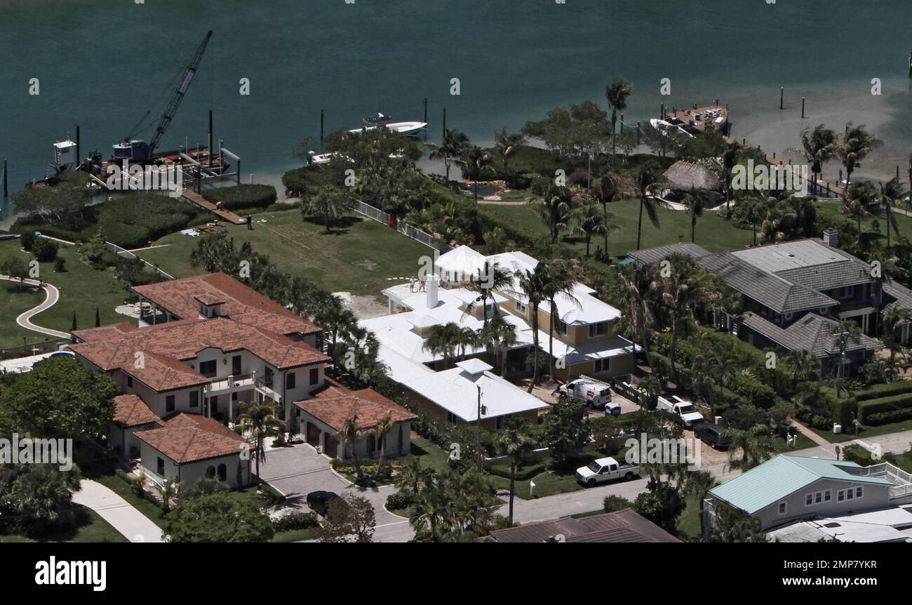 EXCLUSIVE!! Aerial views of actress Olivia Newton-John's $4.1 million, 7000-square-foot home that is currently under renovation.  The Jupiter Inlet Colony, Palm Beach waterfront home was bought by the 'Grease' star and her husband John Easterling in June 2009 one year after the couple wed.  The two-story house that has been described as having a Key West feel, has a wide floor plan, four bedrooms and is pet friendly.  Jupiter, FL. 04/27/10. Stock Photo
