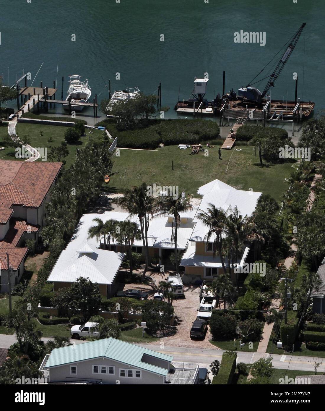 EXCLUSIVE!! Aerial views of actress Olivia Newton-John's $4.1 million, 7000-square-foot home that is currently under renovation.  The Jupiter Inlet Colony, Palm Beach waterfront home was bought by the "Grease" star and her husband John Easterling in June 2009 one year after the couple wed.  The two-story house that has been described as having a Key West feel, has a wide floor plan, four bedrooms and is pet friendly.  Jupiter, FL. 04/27/10.  B Stock Photo
