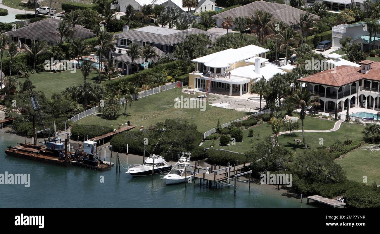 EXCLUSIVE!! Aerial views of actress Olivia Newton-John's $4.1 million, 7000-square-foot home that is currently under renovation.  The Jupiter Inlet Colony, Palm Beach waterfront home was bought by the 'Grease' star and her husband John Easterling in June 2009 one year after the couple wed.  The two-story house that has been described as having a Key West feel, has a wide floor plan, four bedrooms and is pet friendly.  Jupiter, FL. 04/27/10.  B Stock Photo