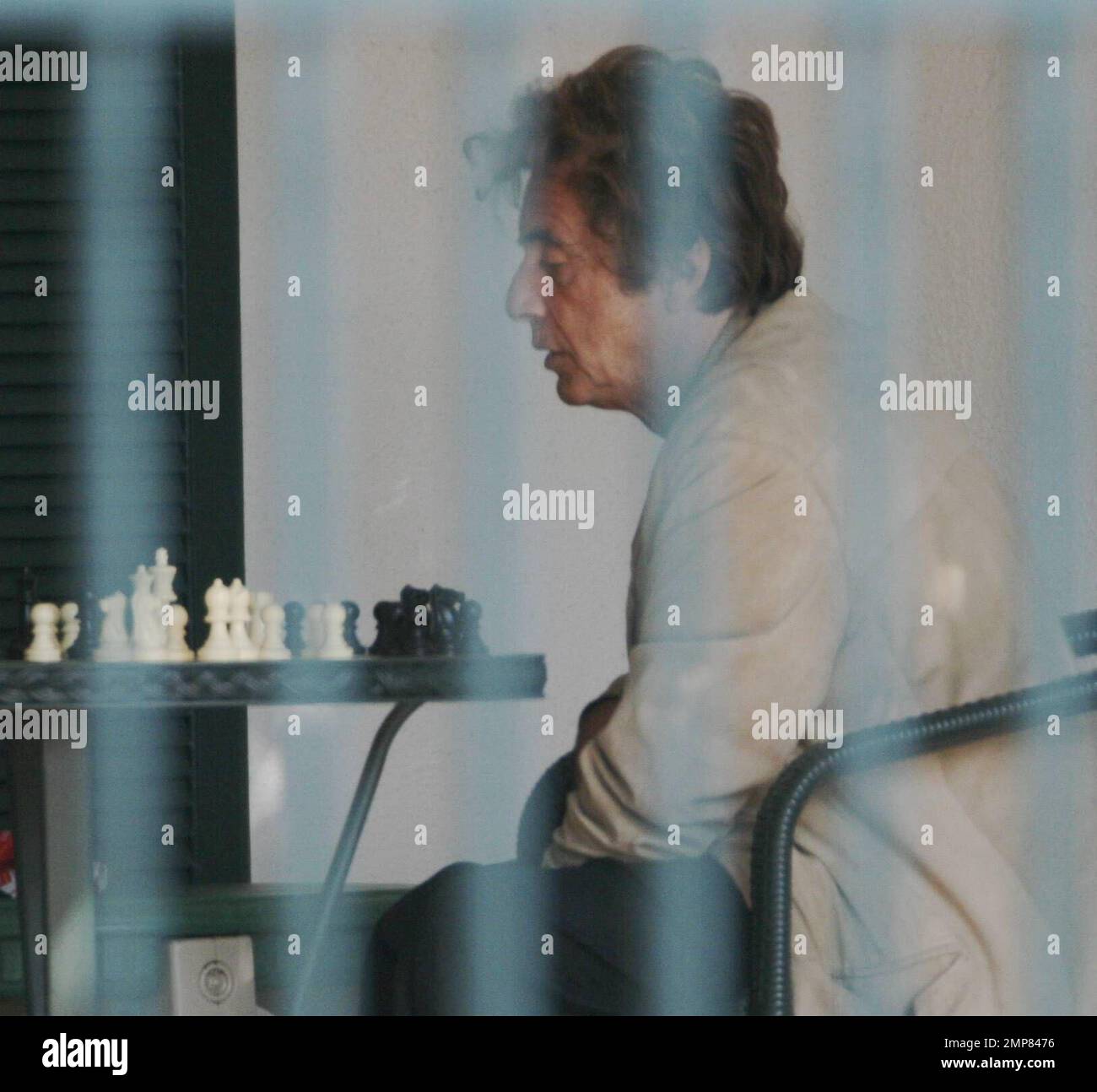 Exclusive!! Al Pacino plays a game of chess with a friend. The actor