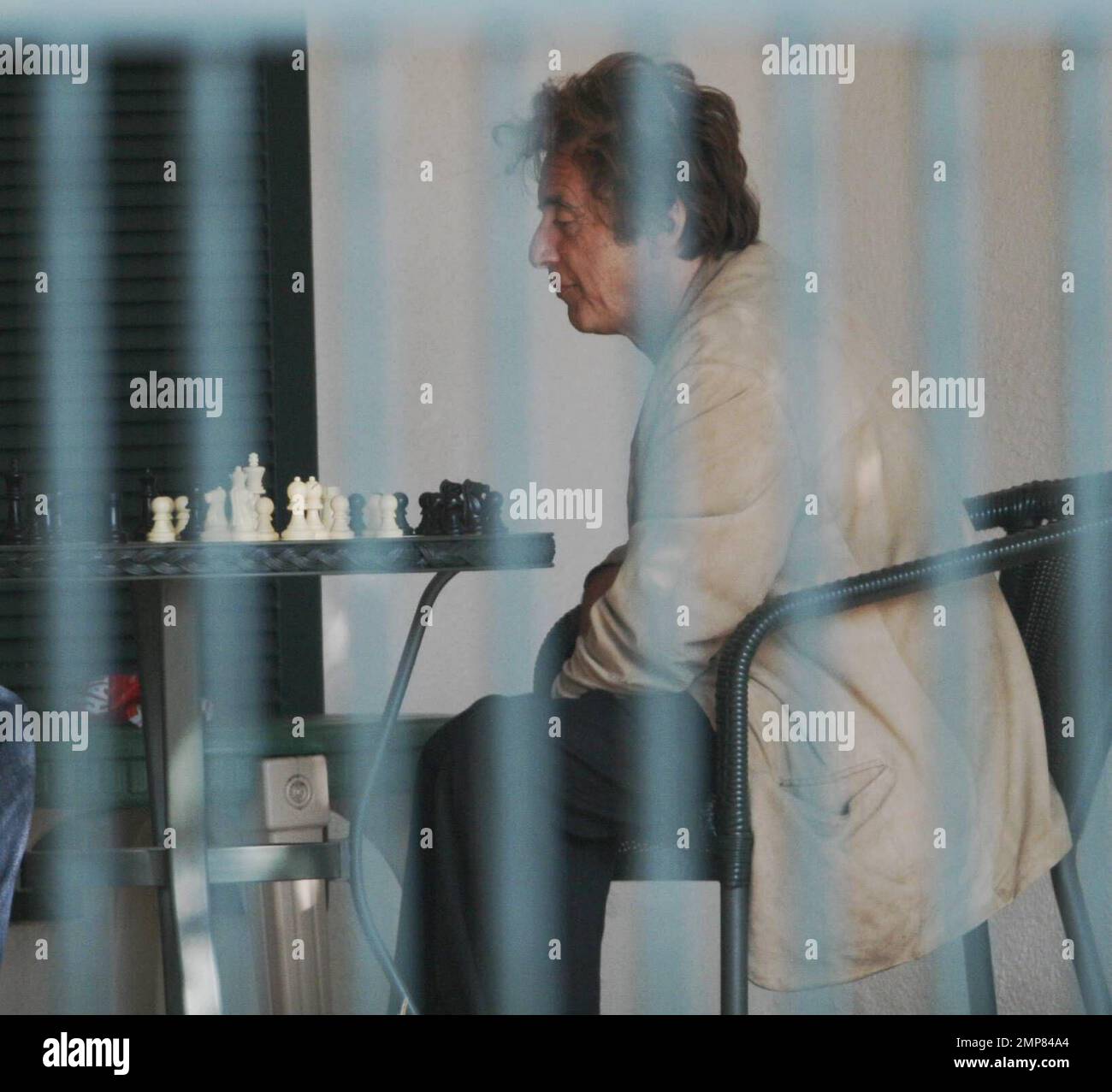 Exclusive!! Al Pacino plays a game of chess with a friend. The actor