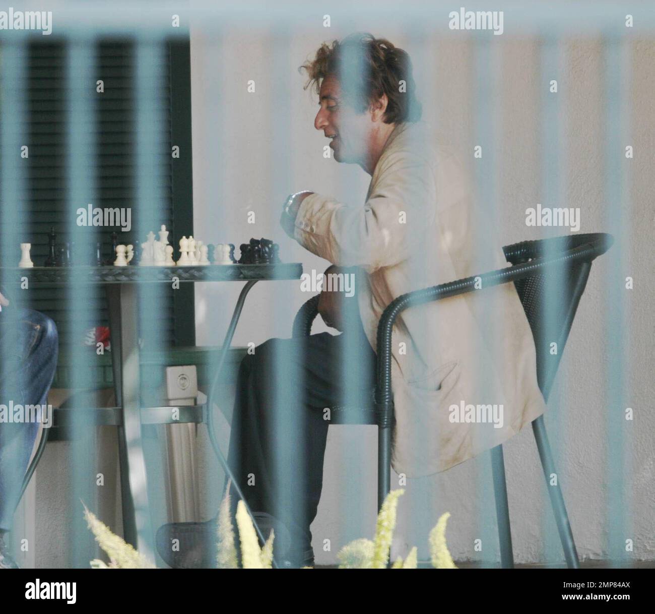 Exclusive!! Al Pacino plays a game of chess with a friend. The actor