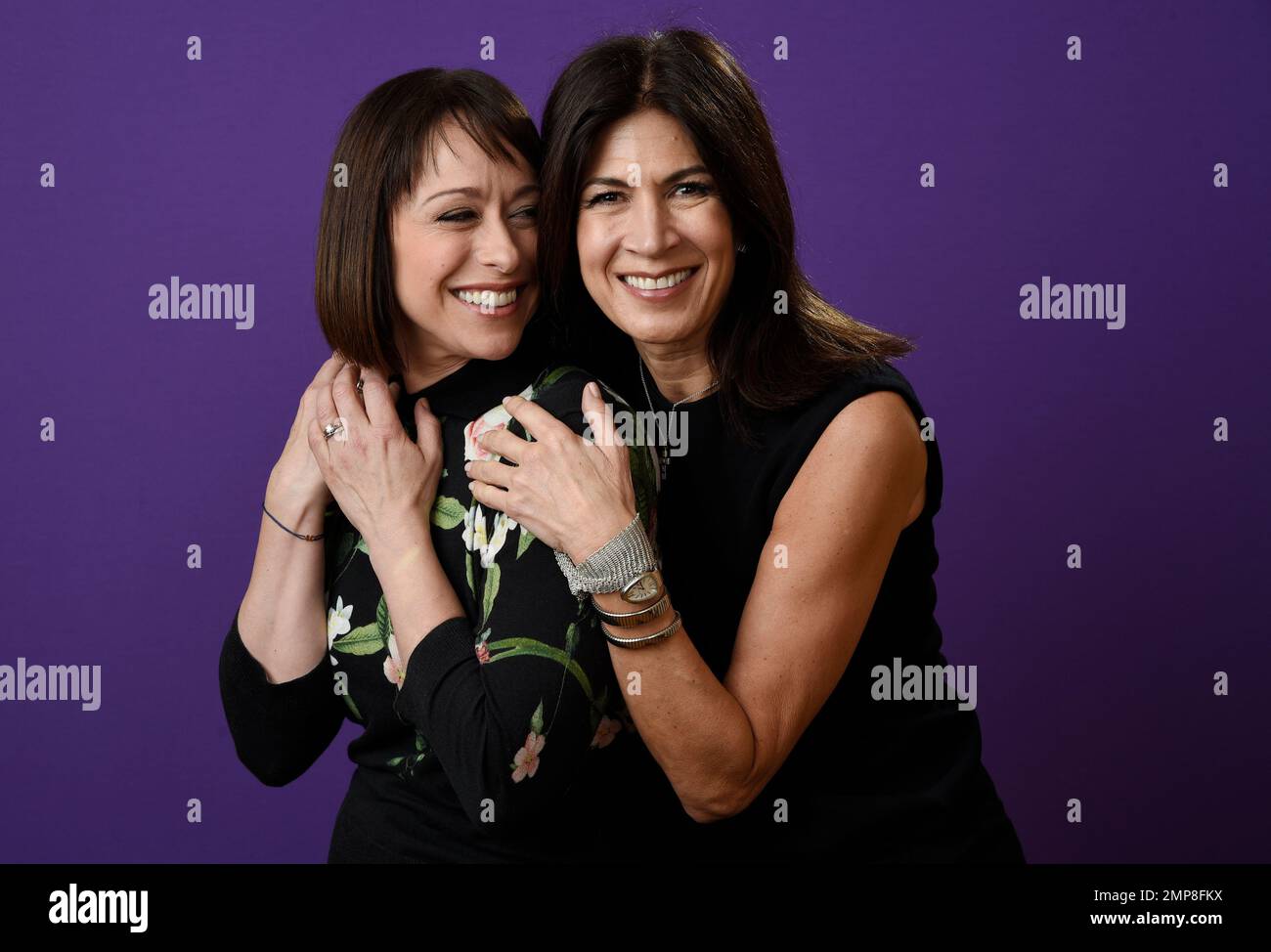 Paige Davis, left, and Hildi Santo-Tomas, cast members in the TLC ...