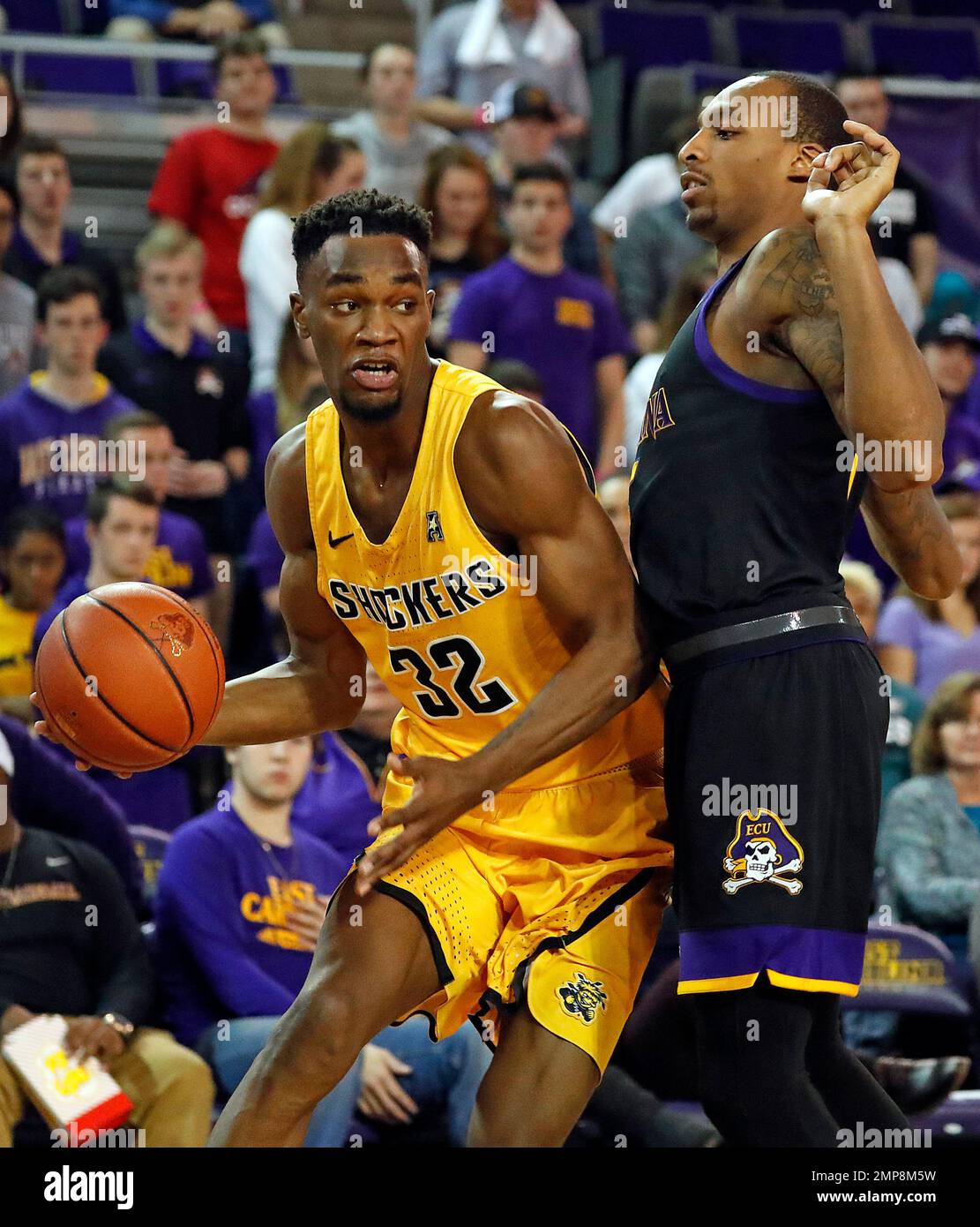 Wichita State's Markis McDuffie (32) drives the ball around East