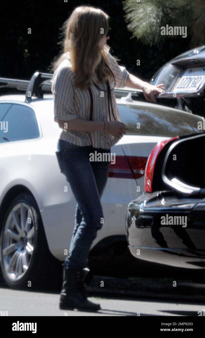 EXCLUSIVE!! Actress Amanda Seyfried was seen being dropped off at her home with her dog and some shopping bags. The 26 year old actress stars in the up coming film, "Gone," in which she plays a woman who is convinced the serial killer who kidnapped her two years prior has returned and she sets out to face her abductor. "Gone" is due out on Feb 24th. Los Angeles, CA. 9th February 2012. Stock Photo