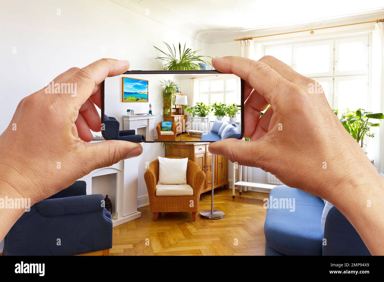 Augmented reality concept hands holding smart phone with AR interior