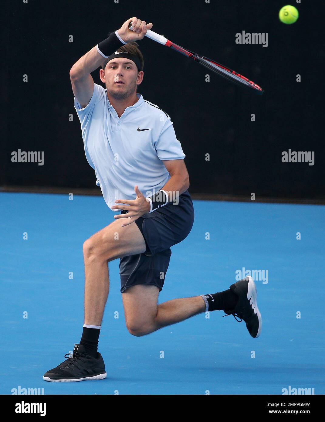 Jared Donaldson of the U.S. hits a forehand to Gilles Simon of France in  their men's singles match at the Sydney International tennis tournament in  Sydney, Tuesday, Jan. 9, 2018. (AP Photo/Rick