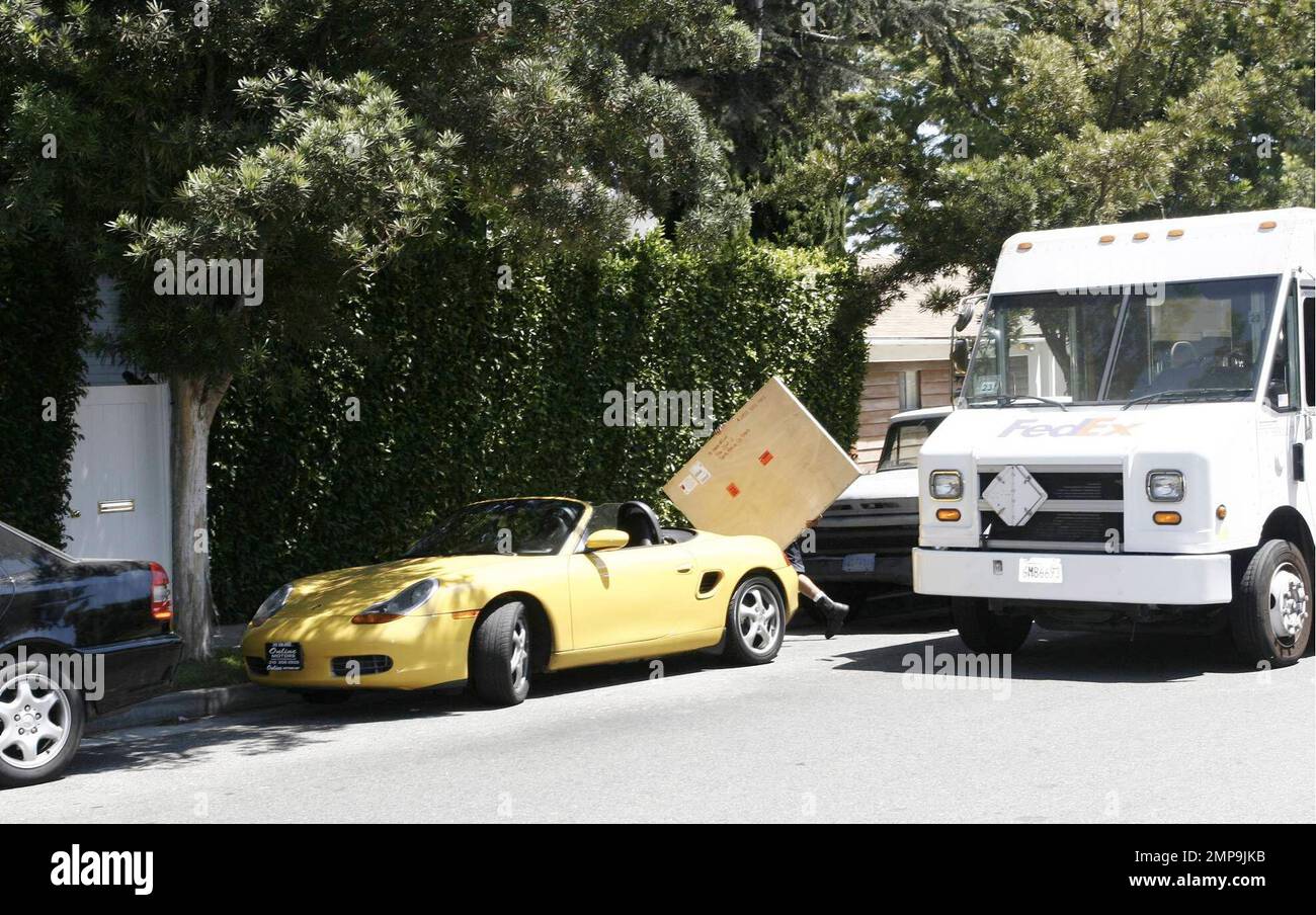 Andrew Wilson, the brother who found actor Owen Wilson at his home on Sunday following an attempted suicide, returns to Owen's house to collect a few belongings. Andrew did not respond to questions from the media but a bystander said he looked 'dishevelled and distraught.' A large package which appeared to be a painting was also delivered in Owen's name via Fedex. Santa Monica, Calif. 8/27/07.All Stock Photo