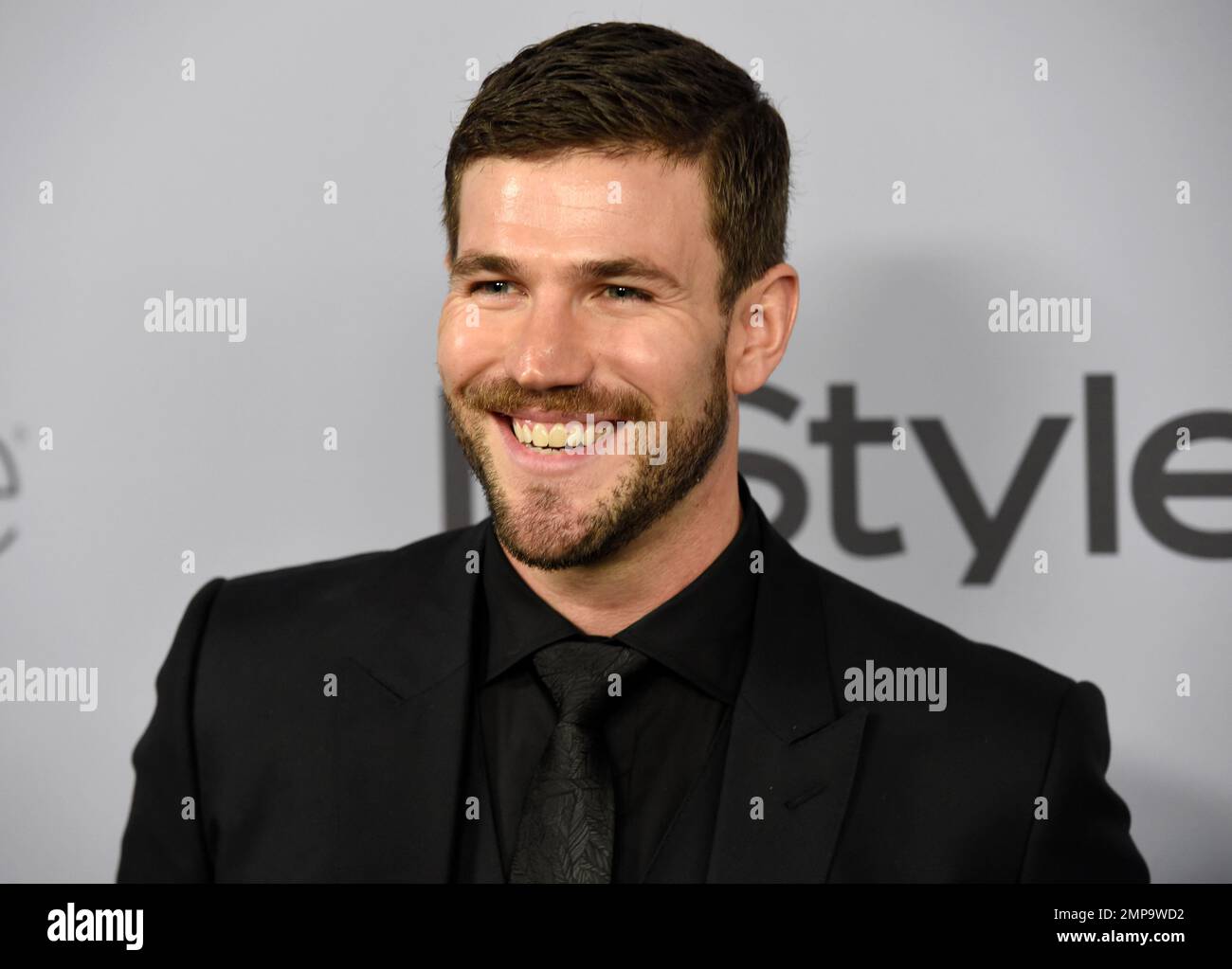 Austin Stowell arrives at the InStyle and Warner Bros. Golden Globes afterparty at the Beverly