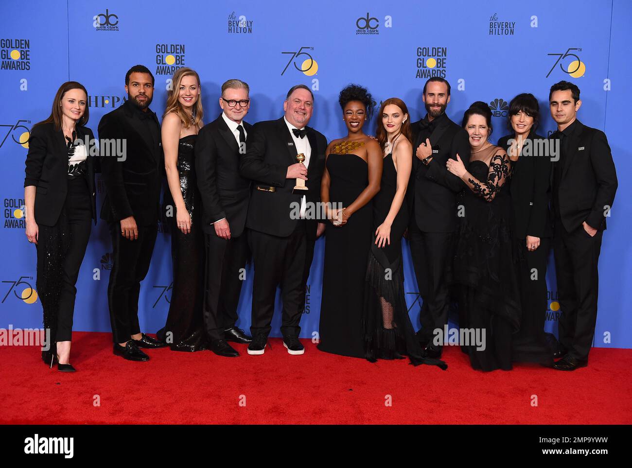 The cast and crew of "The Handmaid's Tale" pose in the press room with