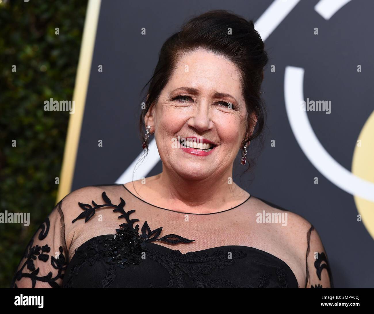 Ann Dowd arrives at the 75th annual Golden Globe Awards at the Beverly