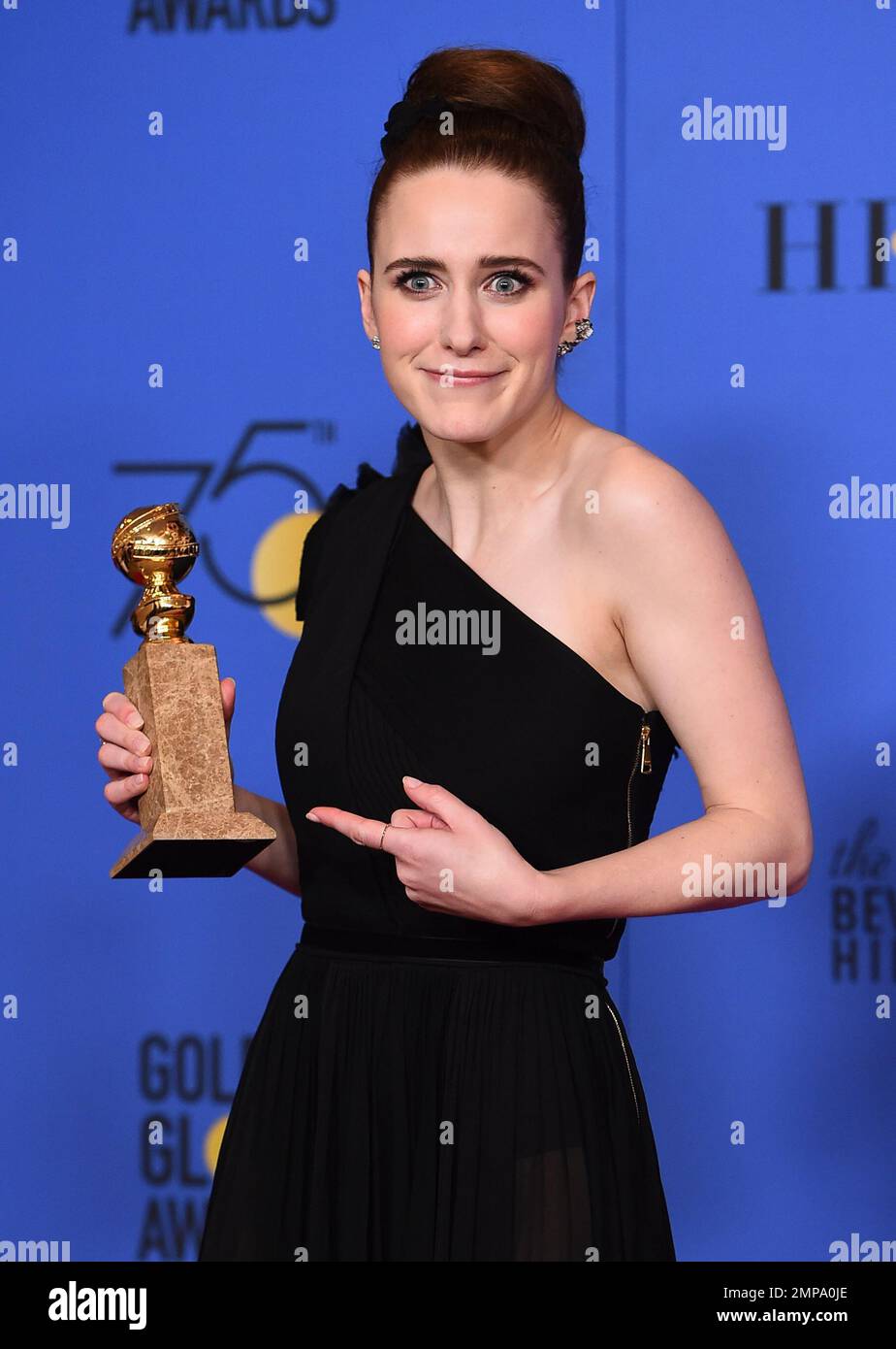 Rachel Brosnahan poses in the press room with the award for best