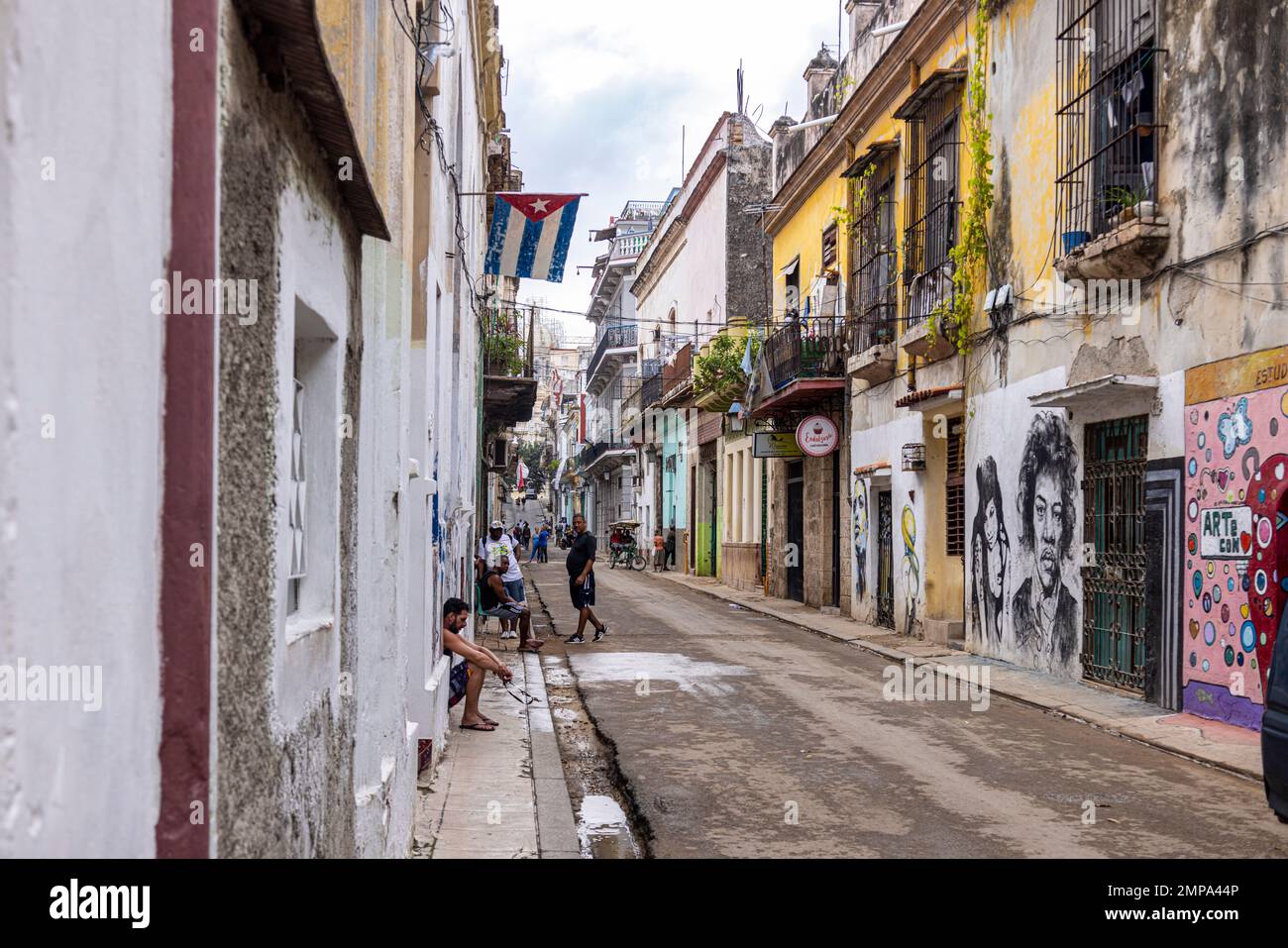 Street with Cuban flag, Old Havana, Cuba Stock Photo