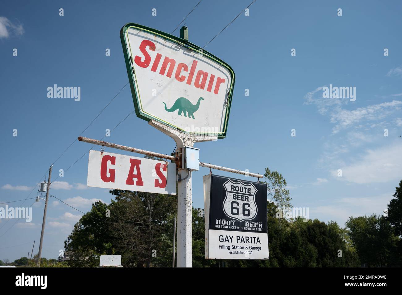 The signboards of Gary's Gay Parita Sinclair Gas Station in the street